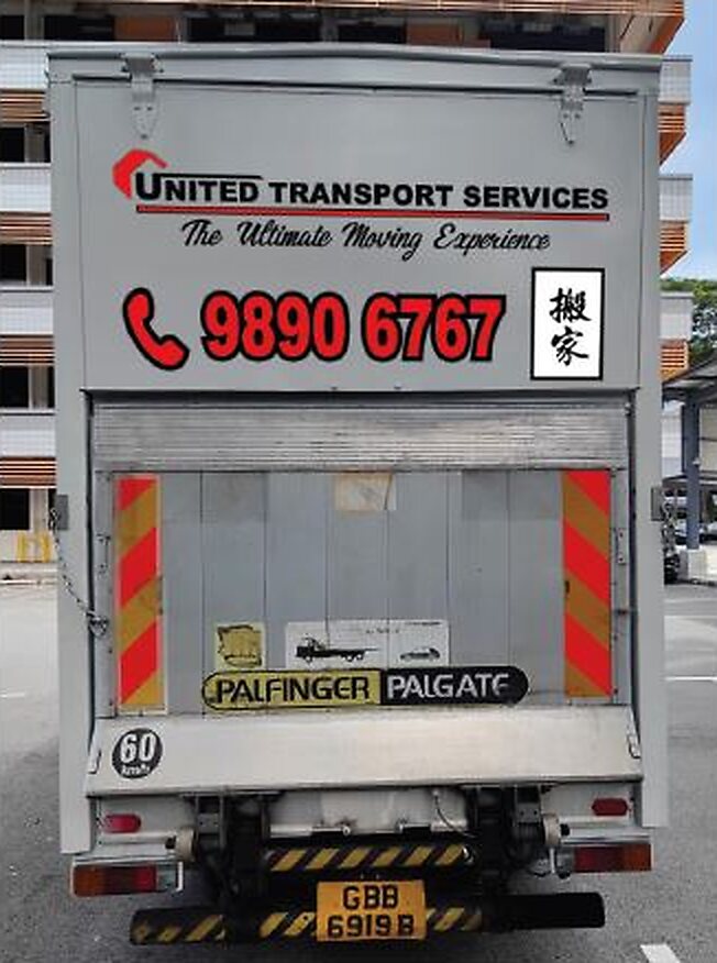 Rear of the United lorry with its tail-lift